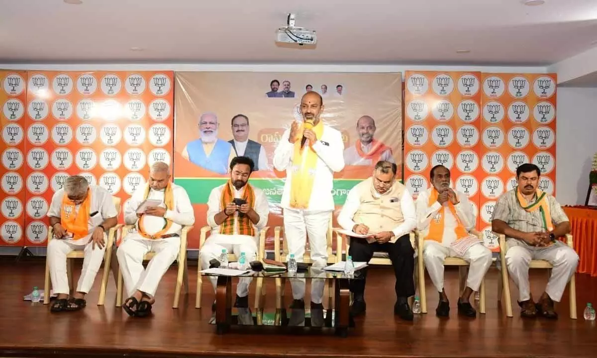 TS BJP chief Bandi Sanjay addressing the party state office bearers meeting in Hyderabad on Monday