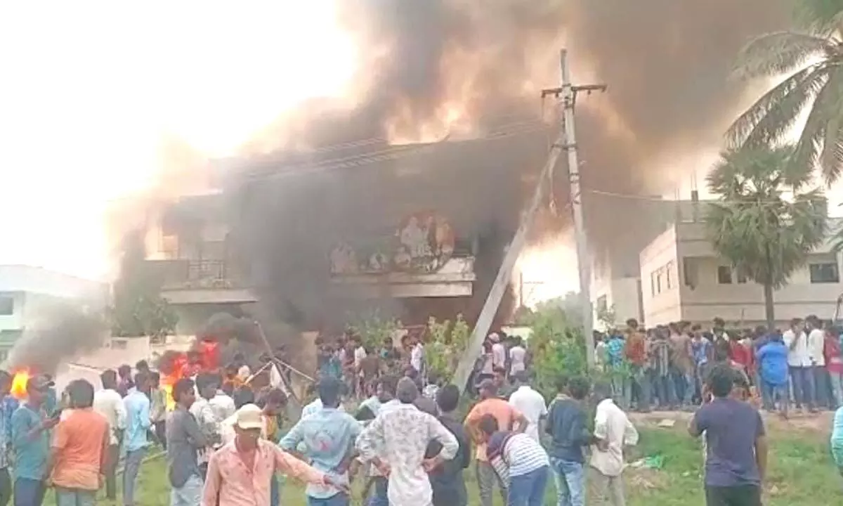 Agitators set minister Viswarups house on fire in protest of renaming of Konaseema district
