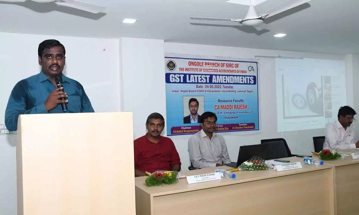 SIRC of ICAI Ongole branch chairman K Ranganayakulu speaking at an awareness programme on amendments in GST in Ongole on Tuesday