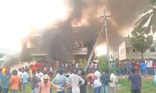 Agitators set minister Viswarups house on fire in protest of renaming of Konaseema district
