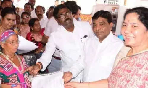 Ministers Ajay, Satyavathi Rathod and MP Nama Nageswara Rao distributing certificates to tribal women who were selected under Giri Vikas programme in Khammam on Tuesday