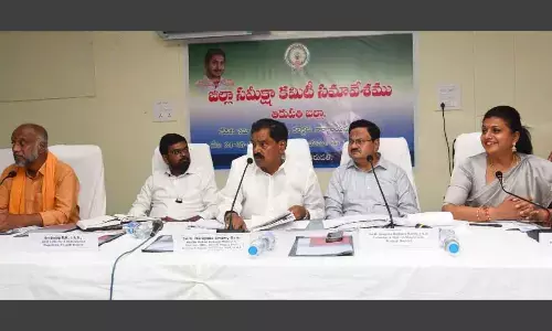 Deputy Chief Minister K Narayana Swamy addressing the DRC meeting in Tirupati on Tuesday. Minister R K Roja,  Collector K Venkata Ramana Reddy, JC DK Balaji and ZP Chairman G Srinivasulu are also seen.