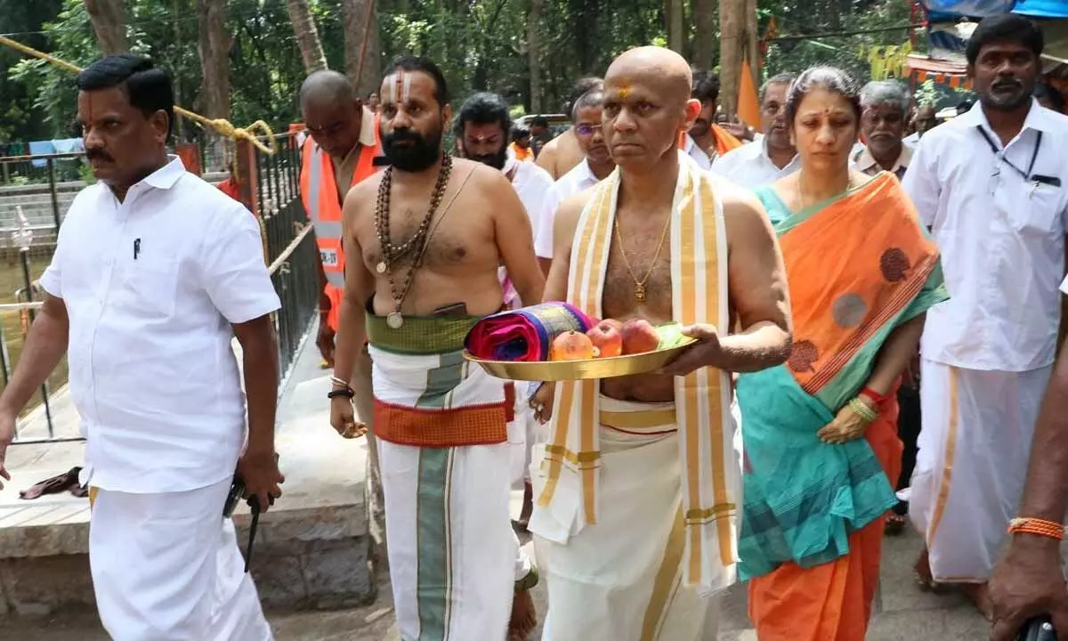 TTD EO A V Dharma Reddy along with his spouse carrying silk vasthrams to present to Anjaneya Swamy to mark the Hanuman Jayanthi celebrations in Japali in Tirumala hills.