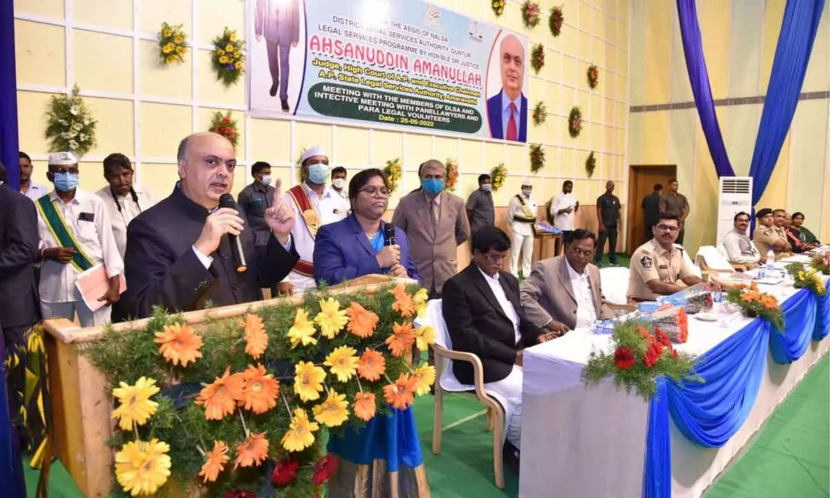 AP High Court Judge and AP State Legal Services Authority Executive Chairman Justice Ahsanuddin Amanullah addressing a meeting at Guntur Medical College auditorium on Wednesday