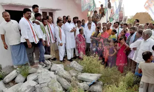 Nalgonda MP Uttam Kumar Reddy visited the abandoned  30 2BHK houses located in Burugadda village