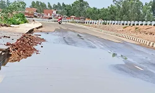 Rainwater stagnated on NH-16 at Tamminaidupeta village