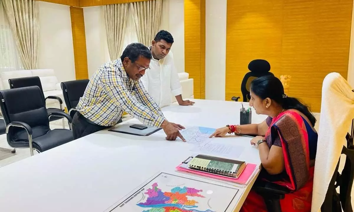 District Collector Dr K Madhavi Latha reviewing the national highway situation in the district with PD (NH) Surendra Nath at her office in Rajamahendravaram on Thursday