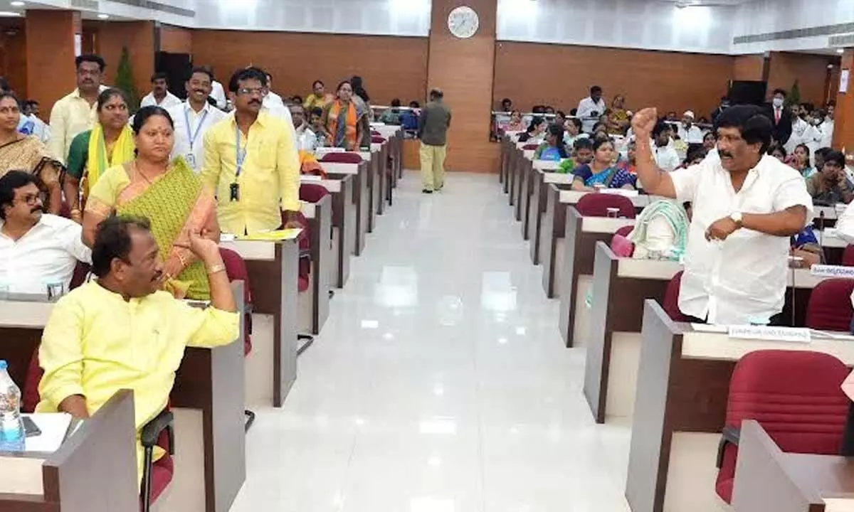 Corporators from the Opposition and ruling party getting into a heated argument during the council meeting held in Visakhapatnam on Thursday.