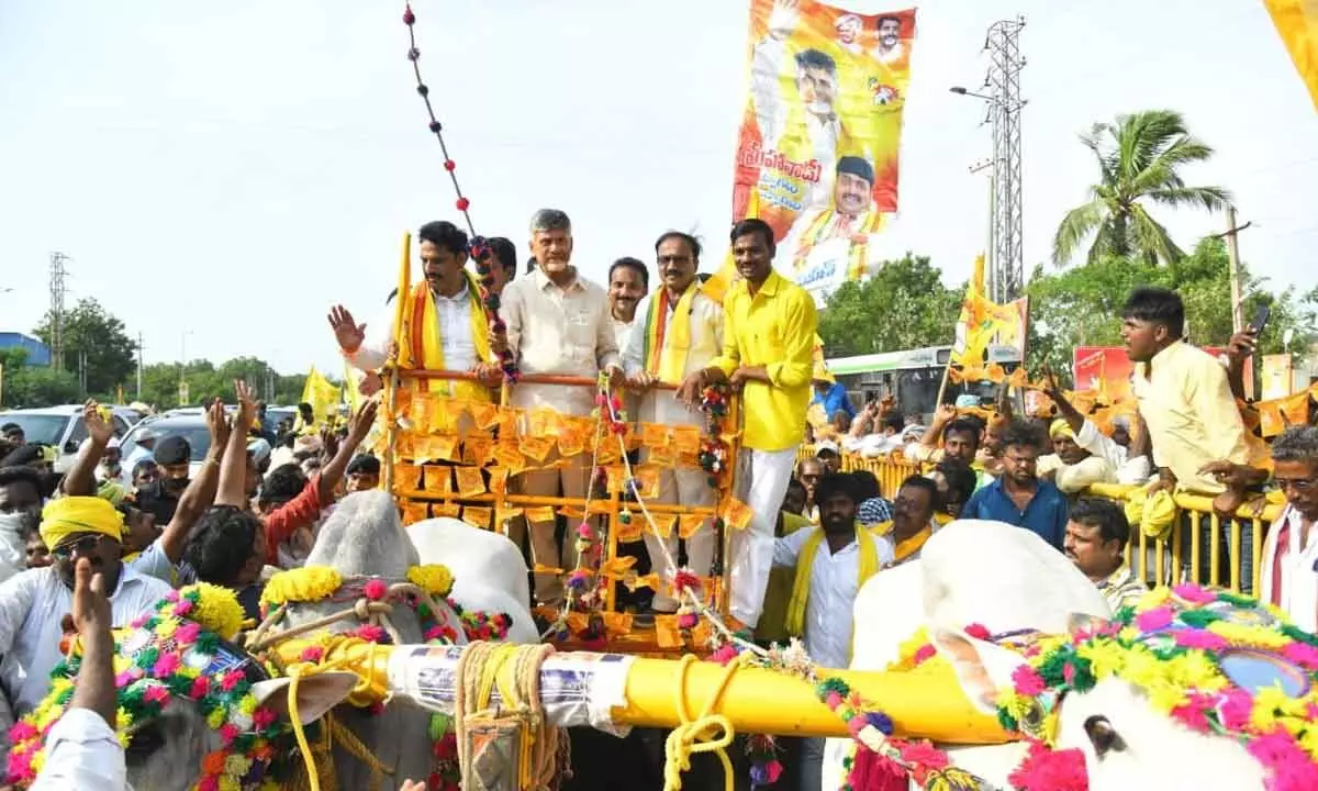 TDP chief N Chandrababu Naidu travelling in a bullock cart during the rally from Mangalagiri to Ongole on Thursday