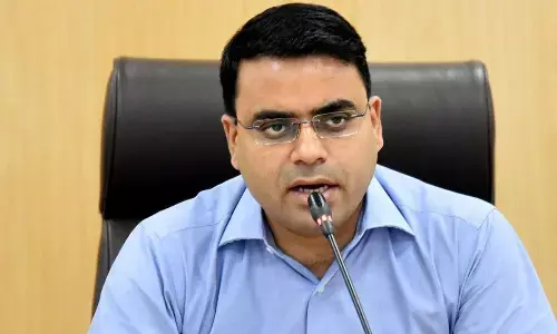 AP CRDA Commissioner Vivek Yadav addressing a meeting in Vijayawada on Thursday