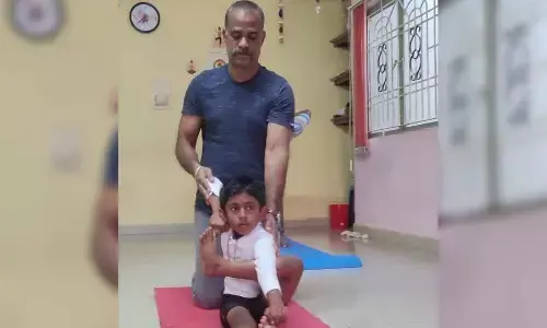 Yoga Association of Chittoor District president Srinivasulu Naidu giving training in Yoga to Vonti Divyanand at his institute in Tirupati.