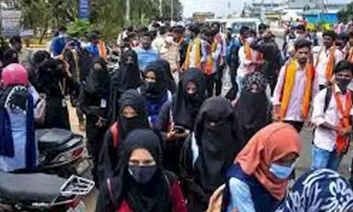 Muslim students accused of wearing headscarves in class