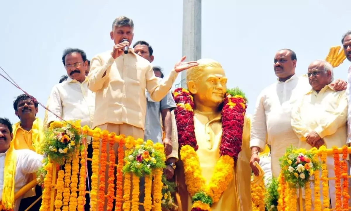 TDP president Nara Chandrababu Naidu speaking after garlanding the statue of NT Ramarao at Addanki Bus Stand Centre in Ongole on Saturday
