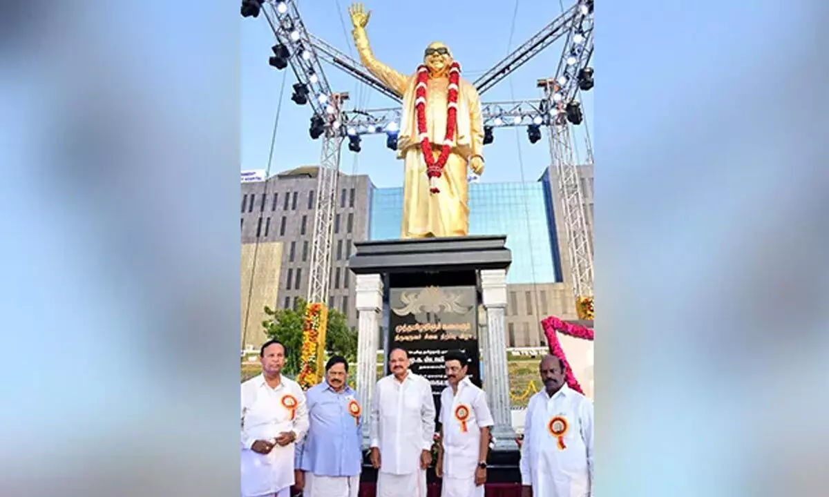 M Karunanidhis which he wore for 4 decades is also mounted on the statue.
