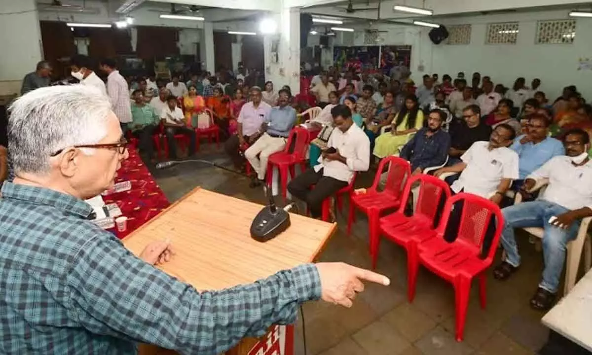Former general secretary of AIIEA K Venu Gopal speaking at a seminar organised by Insurance Corporation Employees’ Union in Visakhapatnam on Sunday