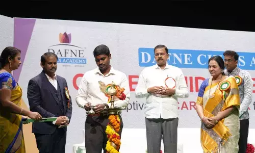 Municipal Commissioner Dinesh Kumar lighting the lamp at a conference on Civils orientation in Rajamahendravaram on Sunday. CBI former Joint Director Lakshmi Narayana is also seen.