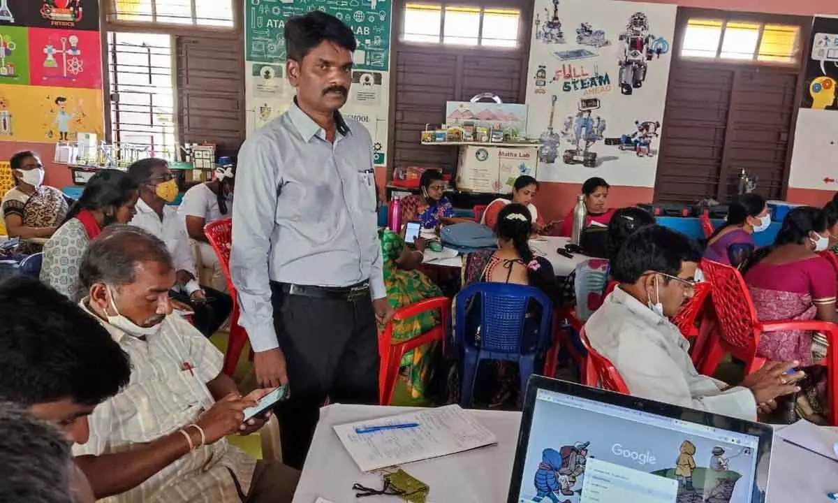 File photo of a workshop to train teachers on digital technologies using computers and smart phones held in Tirupati