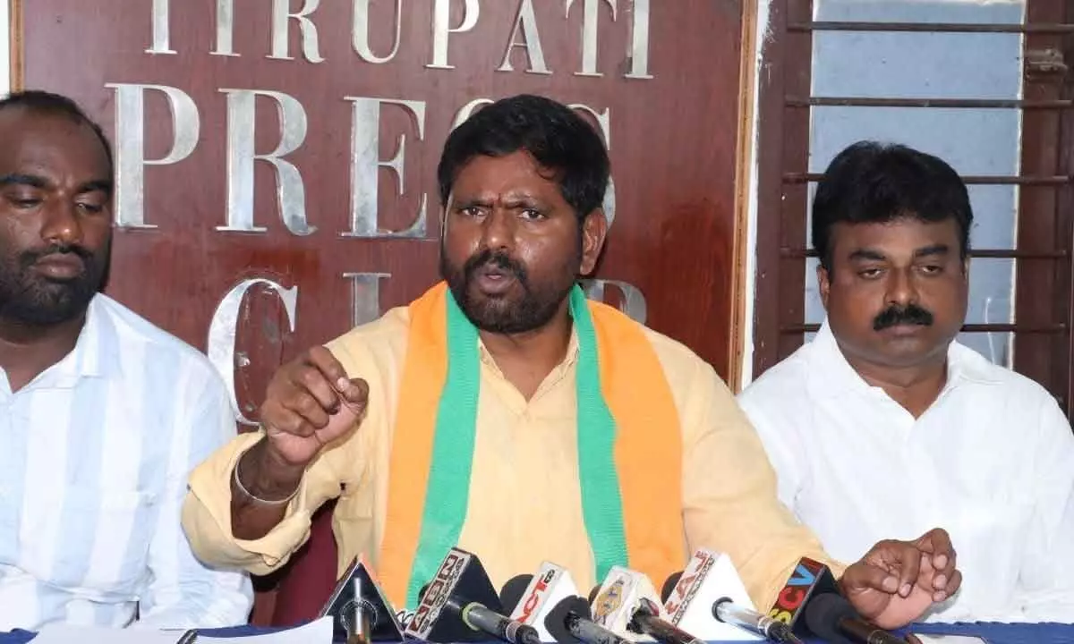 BJP state spokesperson Samanchi Srinivas addressing media persons in Tirupati on Monday.