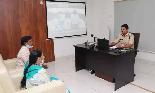 ASP P Srinivas receiving petitions from people during Spandana programme in Kakinada on Monday