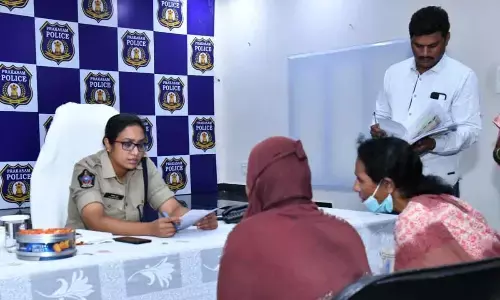 Prakasam SP Malika Garg interacting with the complainants during grievance programme in Ongole on Monday
