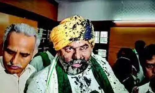 Black ink thrown on farmer leader Tikait; 3 held