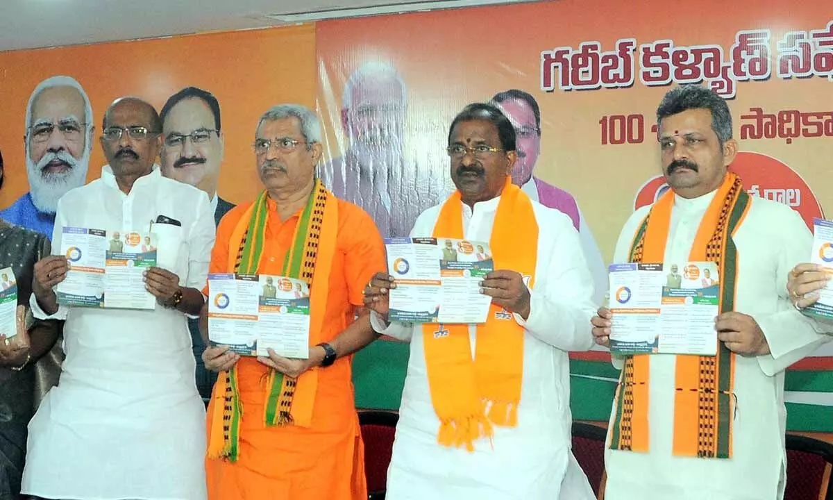 BJP state president  Somu Veerraju and party leaders  releasing a brochure on the schemes of the Narendra Modi government at party office in Vijayawada on Wednesday