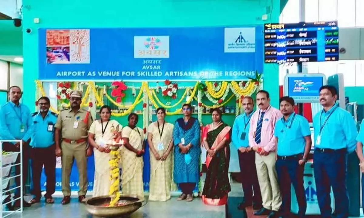 Rajahmundry Airport Director Manoj Kumar Nayak and AAI officers participating in the Self-Help Group outlet launch event under AVSAR at Rajahmundry Airport on Wednesday