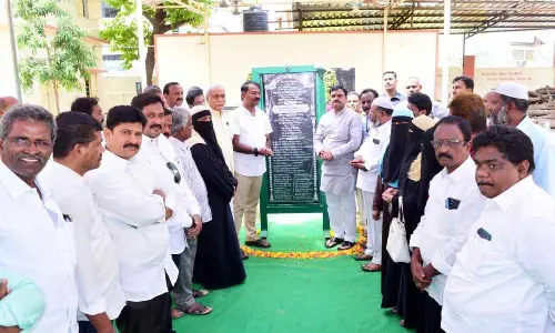 Deputy Chief Minister Amzath Basha along with Mayor K Suresh Babu laying foundation stone for additional classrooms with Rs 1.6 crores Kadapa on Thursday.