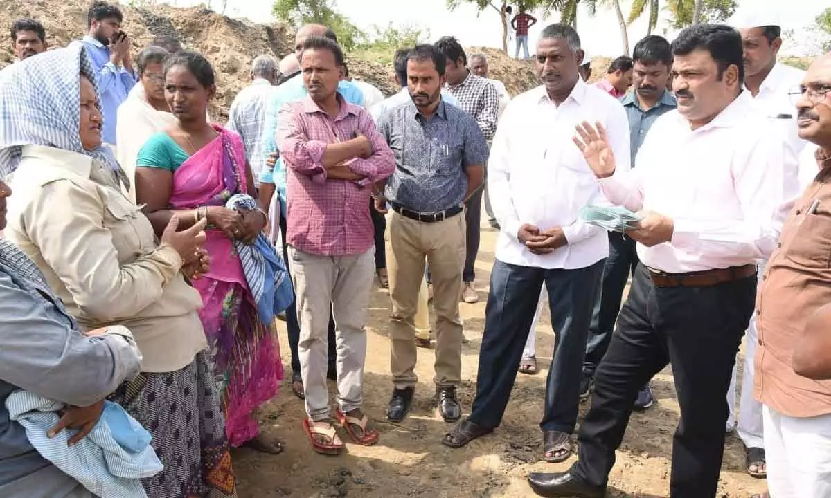 Krishna District Collector P Ranjit Basha inspecting NREGS works at Arisepalli village on Friday