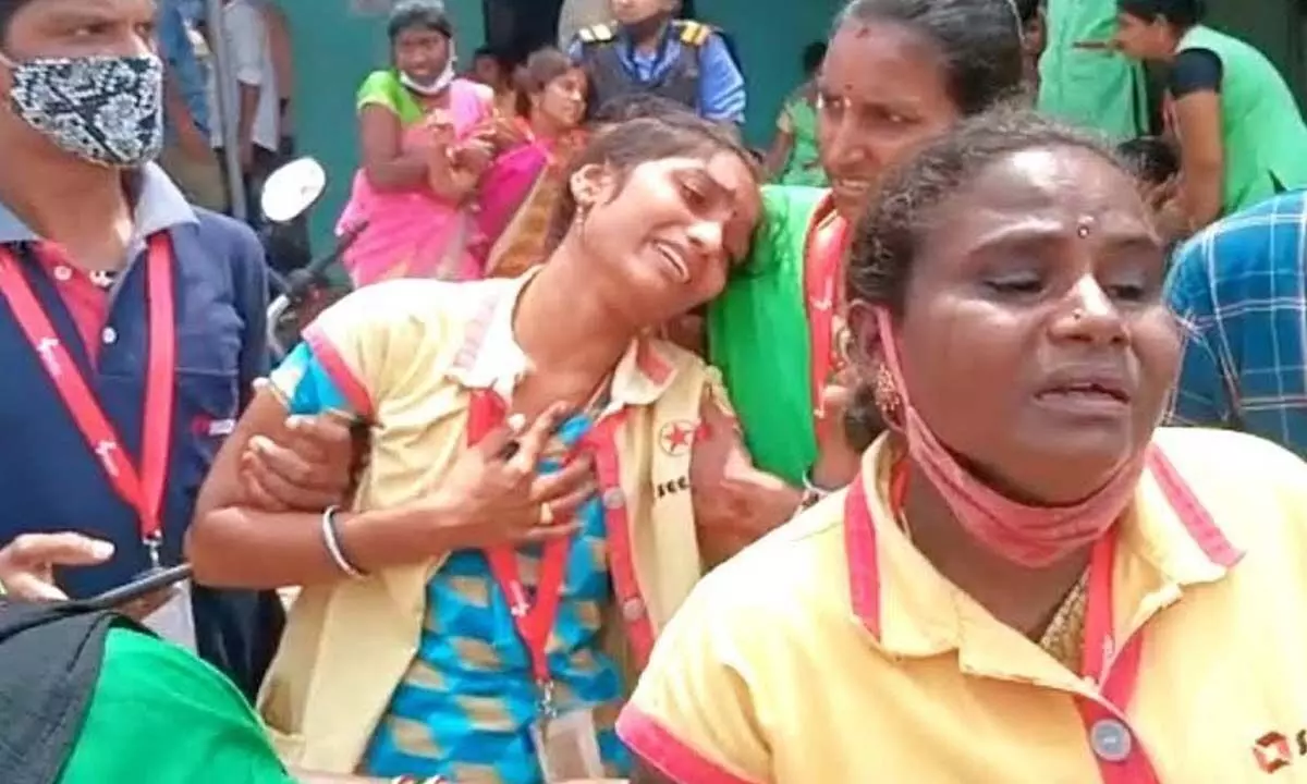 Women experiencing discomfort at the time of incident at Atchutapuram