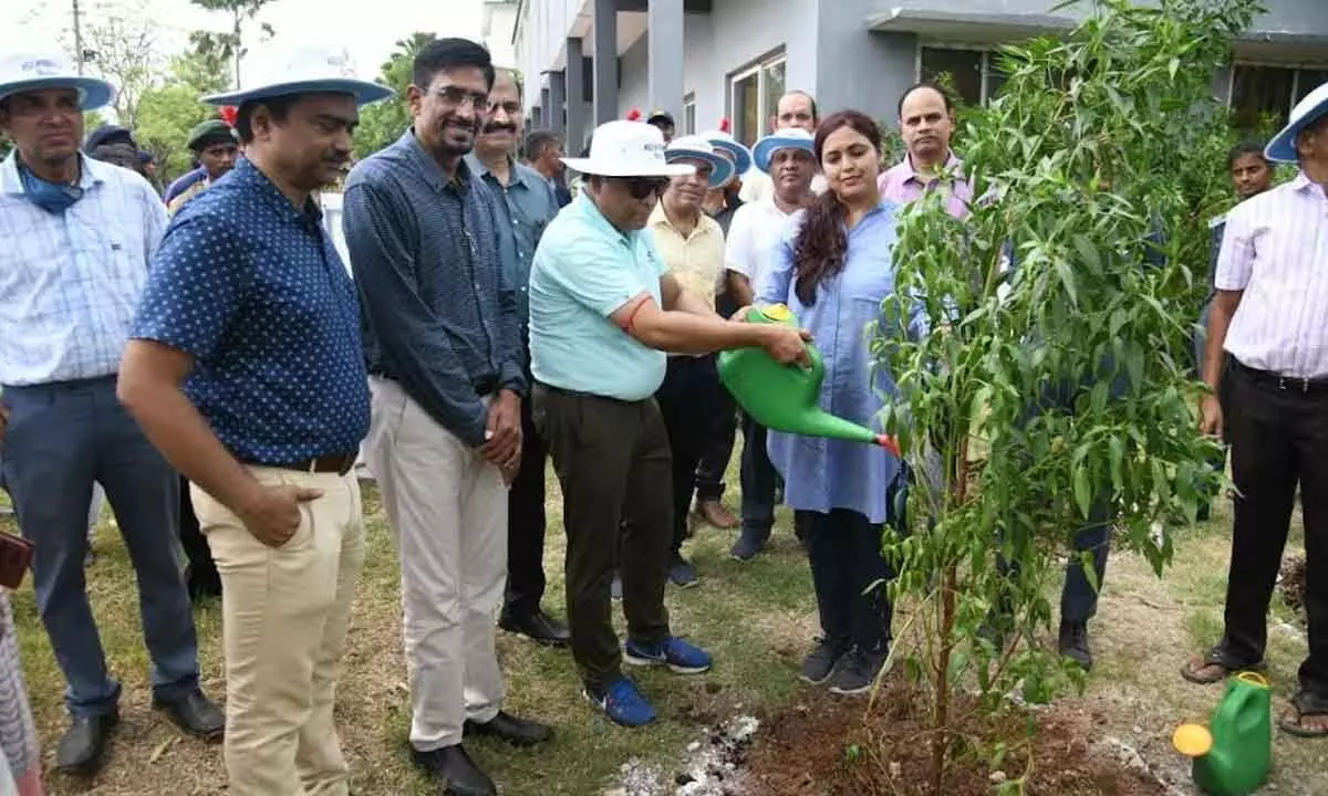 DRM, Waltair Division, Anup Satpathy taking part in a plantation drive in Visakhapatnam on Sunday