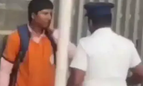 The constable slapped the food delivery person twice.