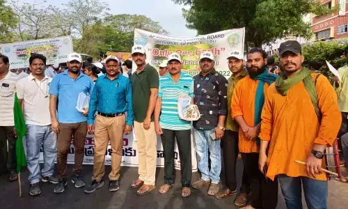 APPCB staff conducting a green rally in Eluru on Sunday