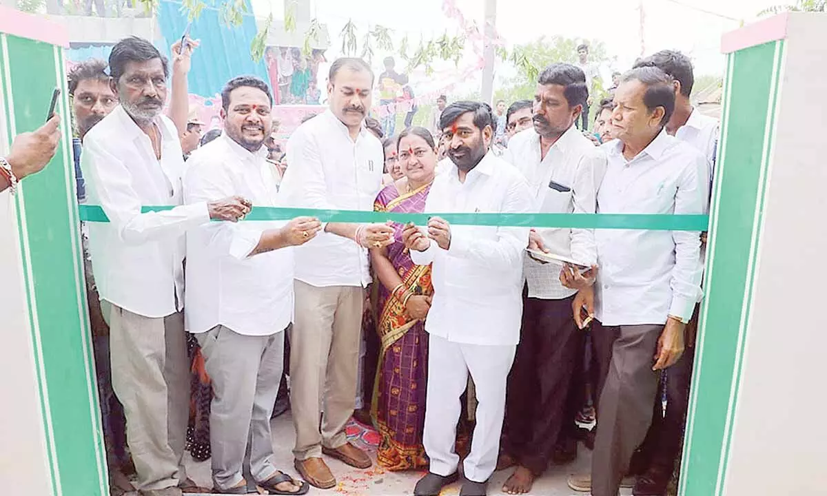 Minister Jagadish Reddy inaugurating a community hall in Suryapet town on Monday