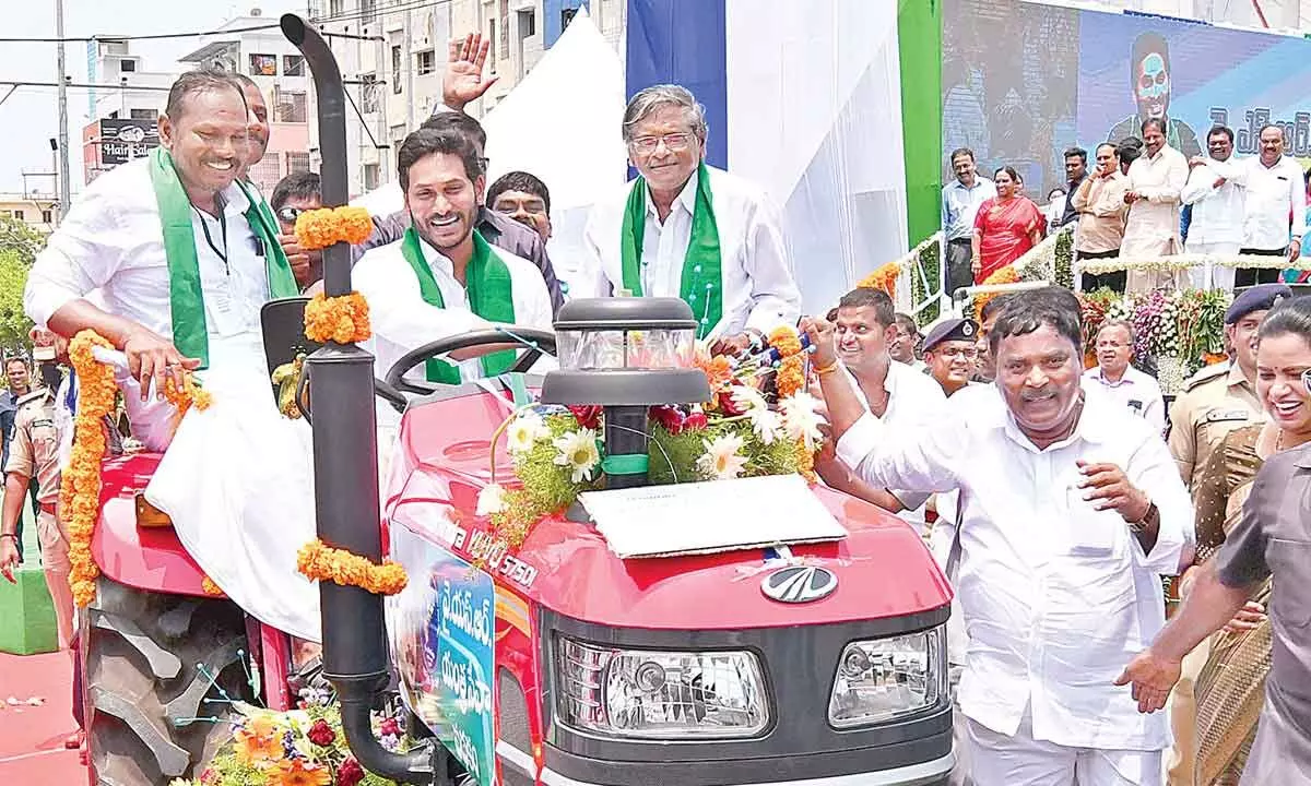 Mega distribution of 3,800 tractors and 320 combine harvesters was flagged off by Chief Minister YS Jagan Mohan Reddy in Guntur on Tuesday