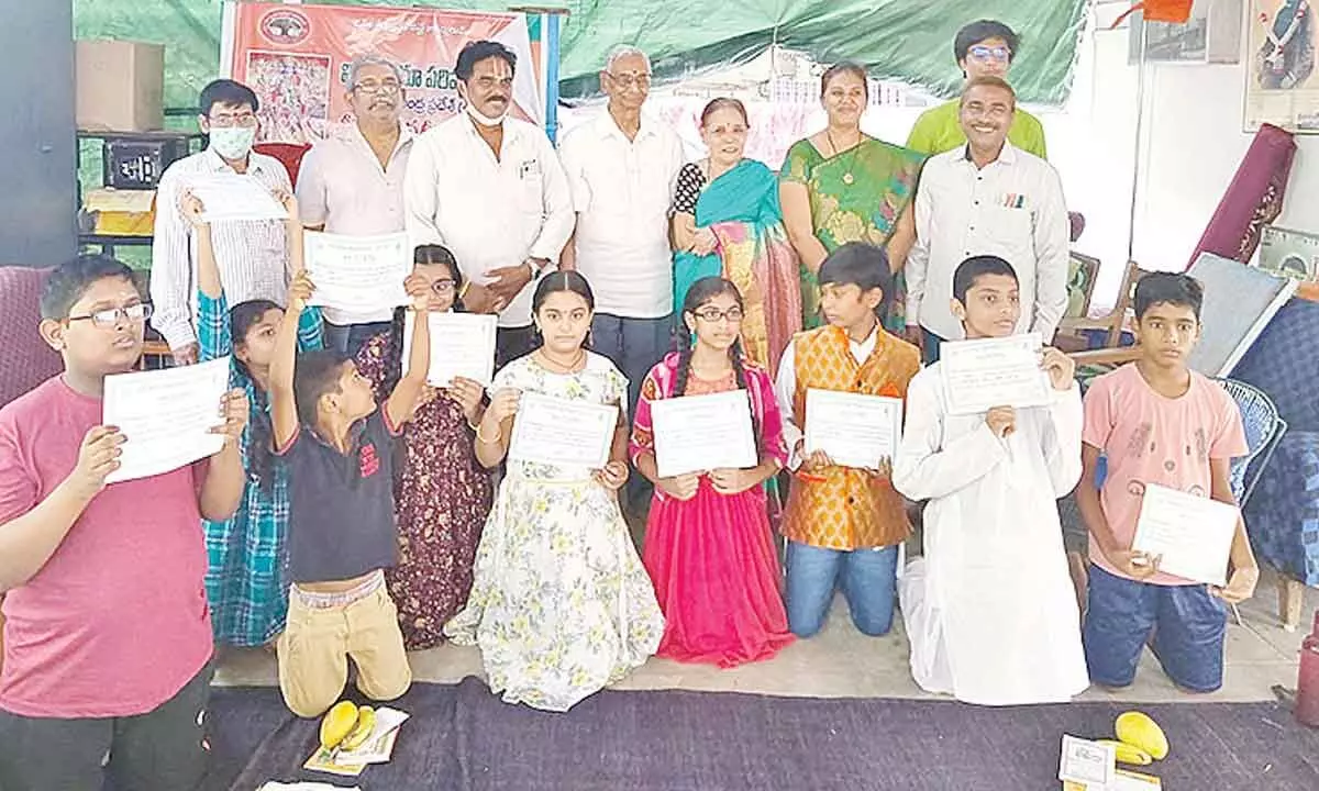 Students, who participated in Bhagavad Gita chanting competitions in Kakinada on Tuesday