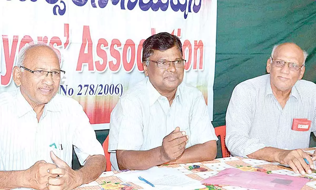 Taxpayers Association president Sambi Reddy and secretary MV Anjaneyulu speaking at a press conference in Vijayawada on Tuesday Photo: Ch Venkata Mastan