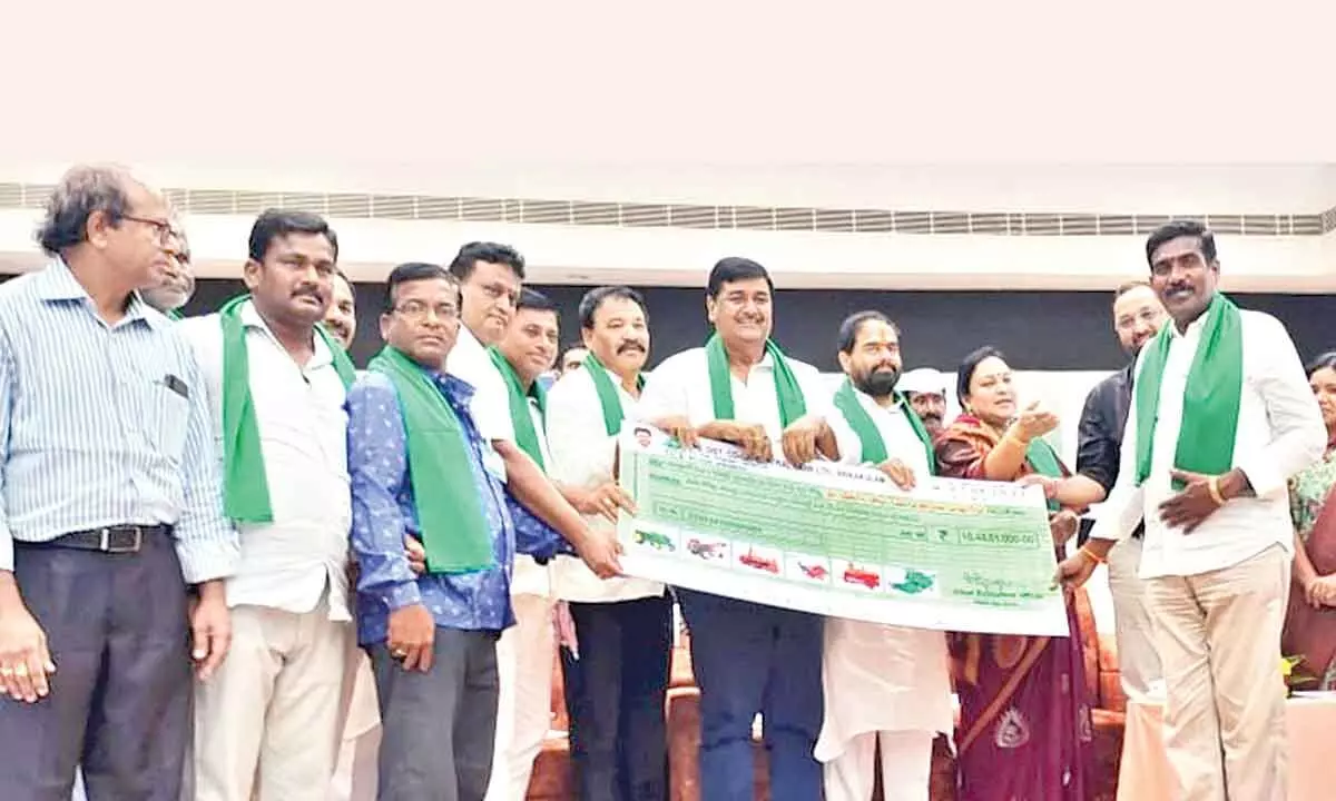 Subsidy amount cheque released by public representatives and officials under YSR Yentra Seva Scheme in Srikakulam on Tuesday
