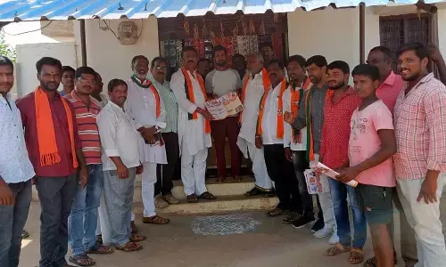 BJP leaders hold door-to-door campaign