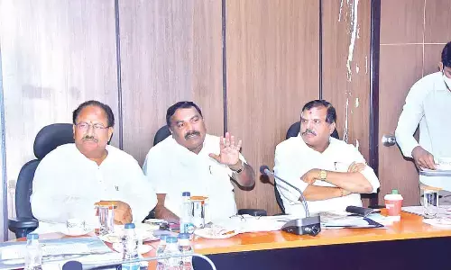Social Welfare Minister Merugu Nagarjuna speaking at a meeting at Scheduled Castes Gurukulam headquarters in Tadepalli on Tuesday. Deputy Chief Minister Kottu Satyanarayana and Education Minister Botcha Satyanarayana are also seen.