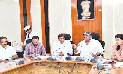 Minister G Kamalakar speaking at a review meeting in Karimnagar on Tuesday