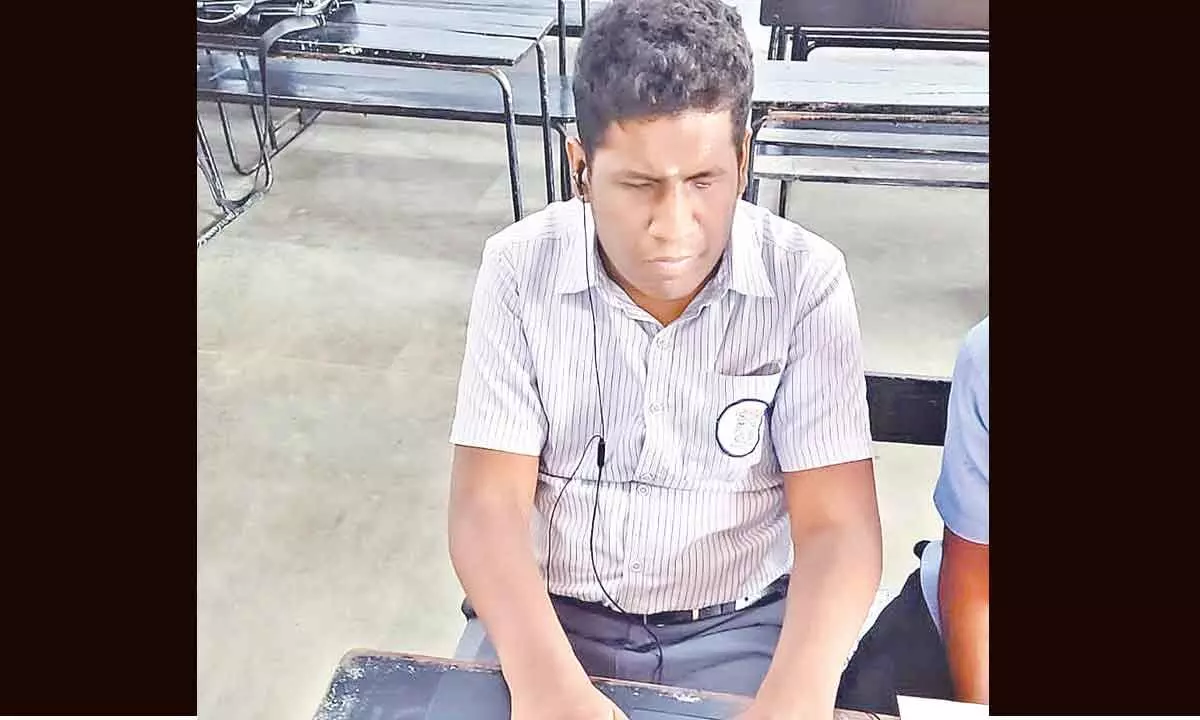 Visually impaired students write exams with laptops