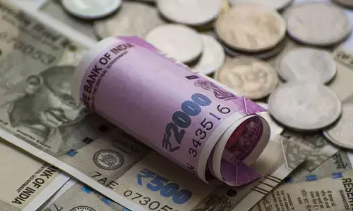 Rupee slips 8 paise to close at 77.76 against US dollar