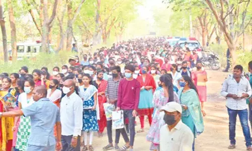 File picture of youths who attended a qualifying exam conducted recently by the police department for free training in Karimnagar
