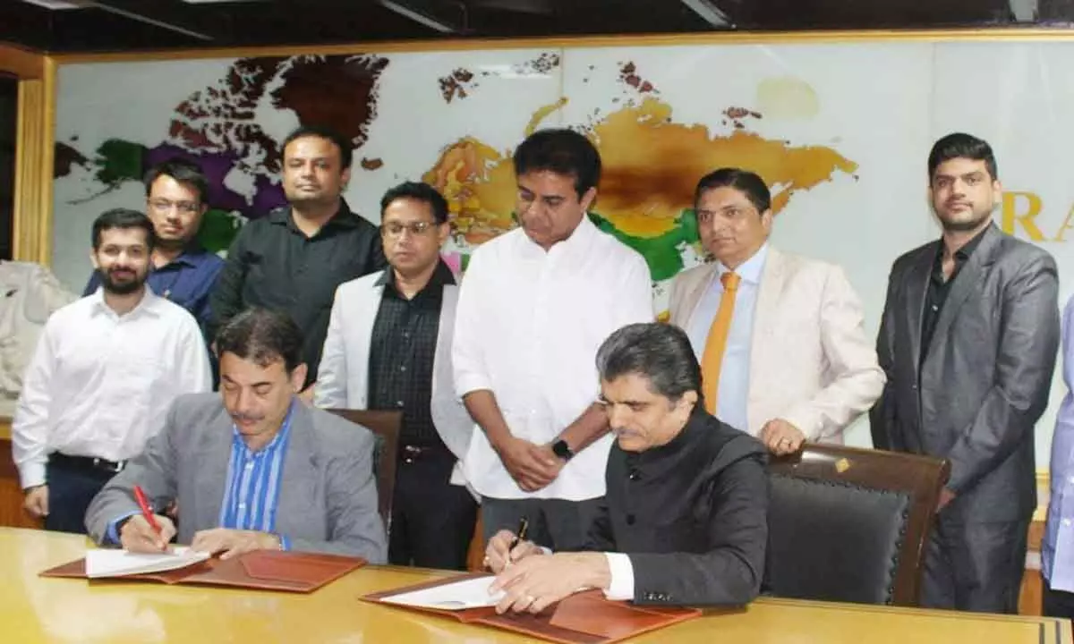 IT Minister K T Rama Rao and Rajesh Exports Chairman Rajesh Mehta witness the signing of an MoU on the mega facility