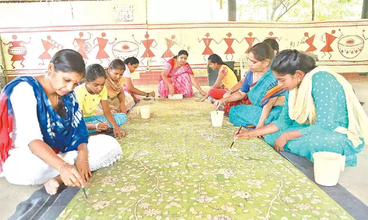 Women taking part in a training programme in Kalamkari art at Tirupati Shilparamam