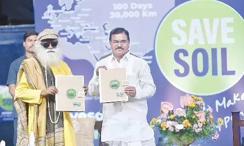 Singireddy Niranjan Reddy with Sadhguru