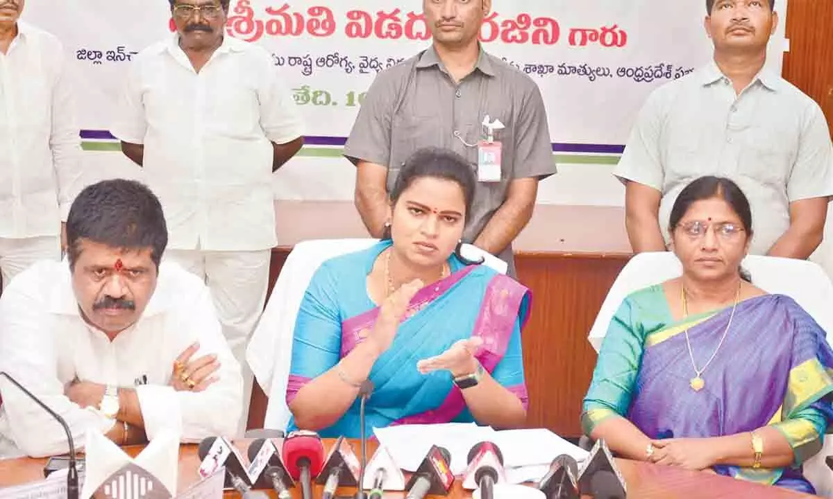 Visakhapatnam in-charge minister V Rajini speaking at a meeting in Visakhapatnam on Thursday