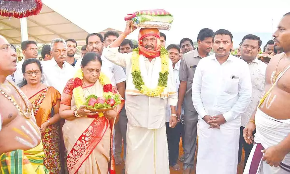 Minister Peddireddi Ramachandra Reddy taking part in Ankurarpanam programme at Vakula Matha temple near Tirupati on Saturday. TTD JEO V Veerabrahmam is also seen.