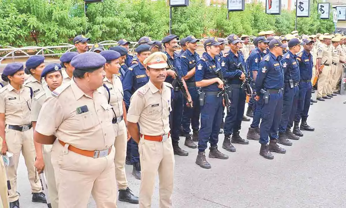 RPF, police, and Octopus forces deployed as part of security measures following Agnipath agitations in the country, in Tirupati railway station on Saturday.